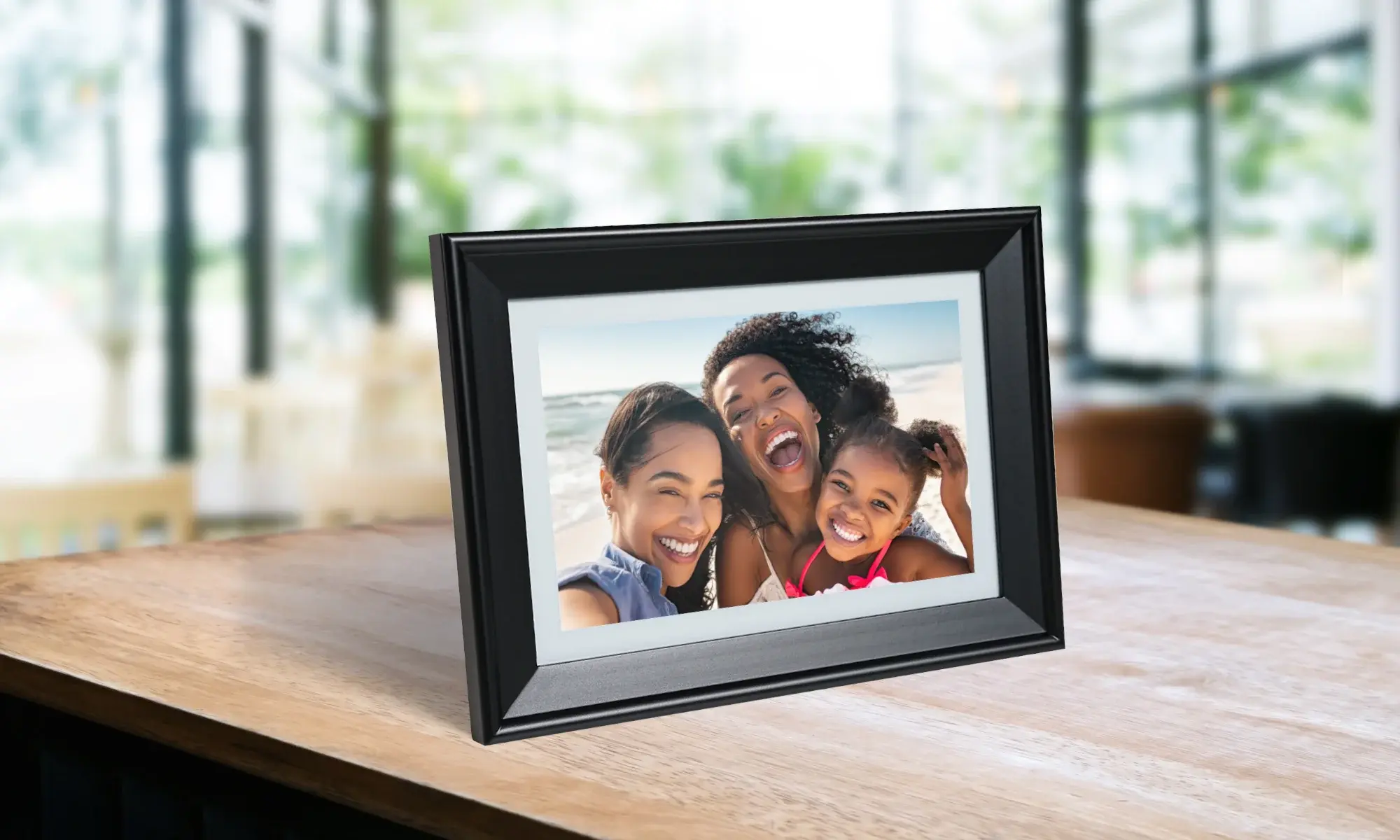 Picture frame with a mother and two daughters in it