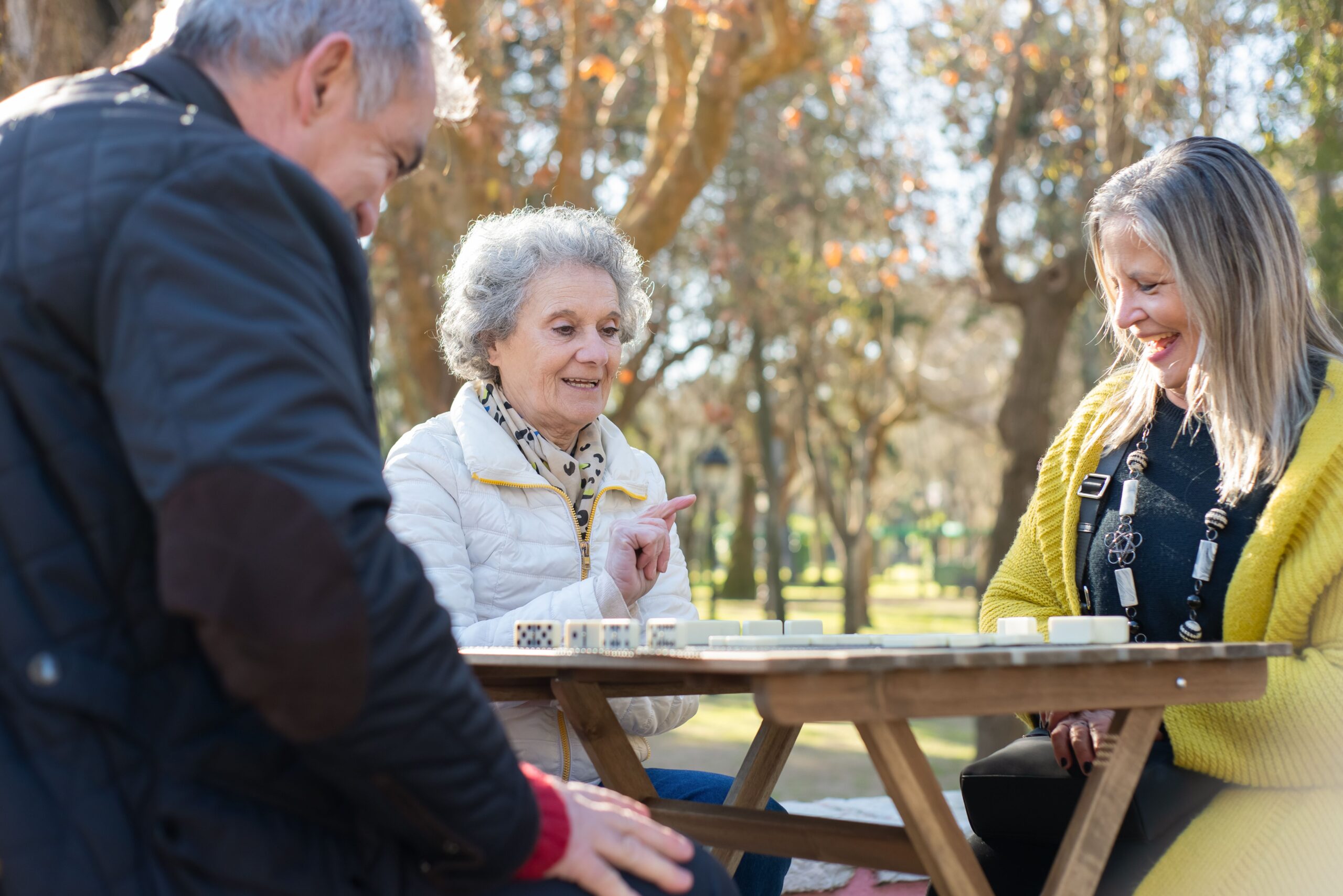 memory games for seniors, group of elderly playing bingo cards